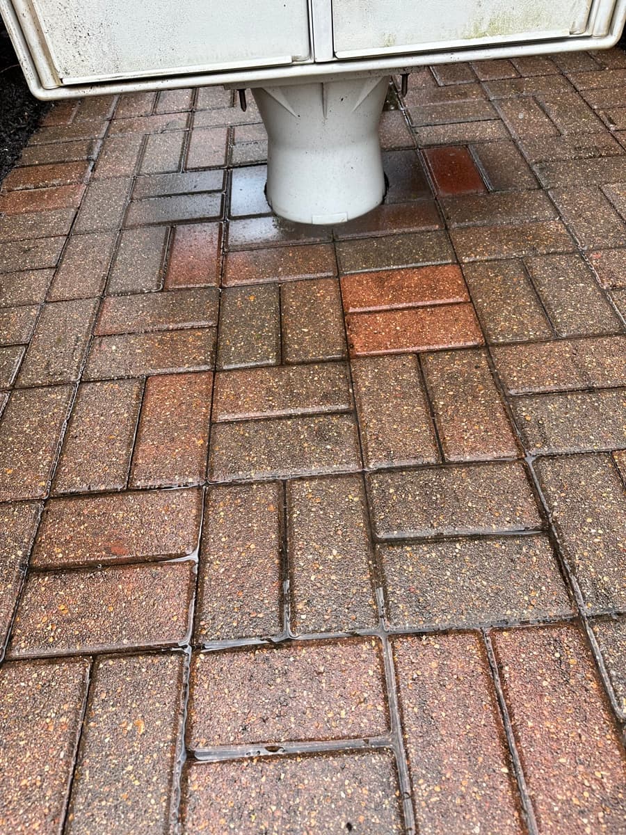 The same patio after pressure washing, clean pavers